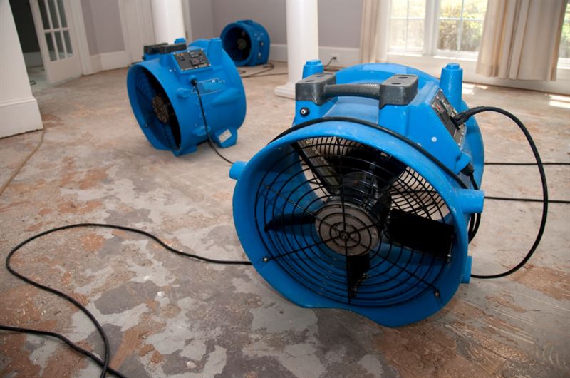 Water damage restoration equipment — industrial drying fans and dehumidifiers